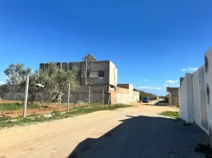 À vendre : Terrain 500 m² à Douikhla – Titre foncier, opportunité à saisir 📞 95 879 360 à Nabeul
