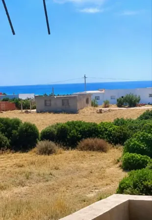 maison R1 près de la mer